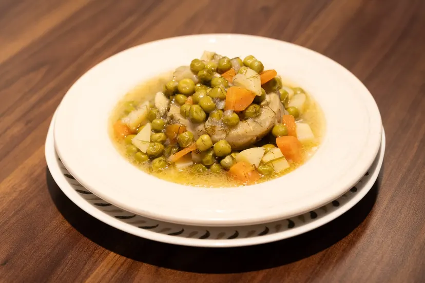 Fresh Artichokes with Vegetables in Olive Oil, cooked daily at Nezaf Ev Yemekleri in Nişantaşı, on a set table