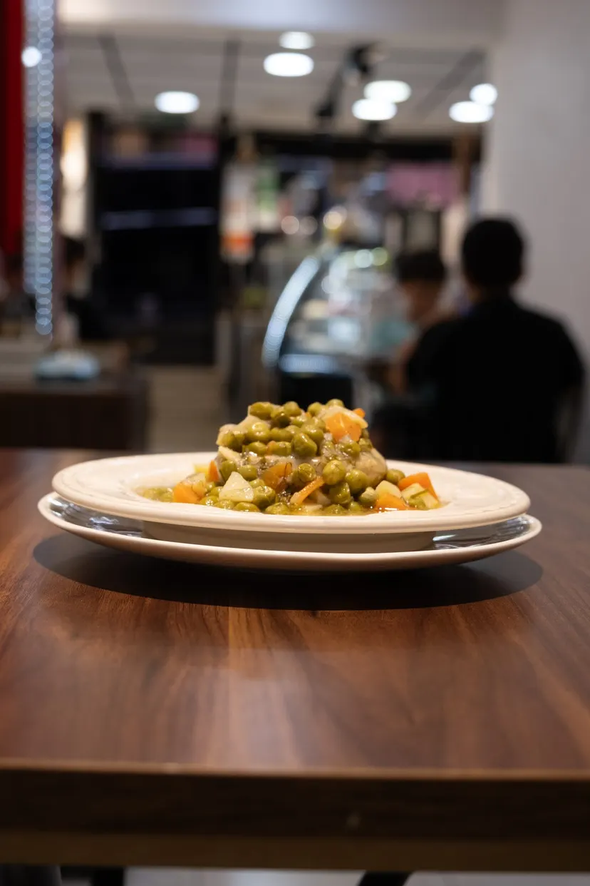 Fresh Artichokes with Vegetables in Olive Oil cooked daily at Nezaf Ev Yemekleri in Nişantaşı, wide shot